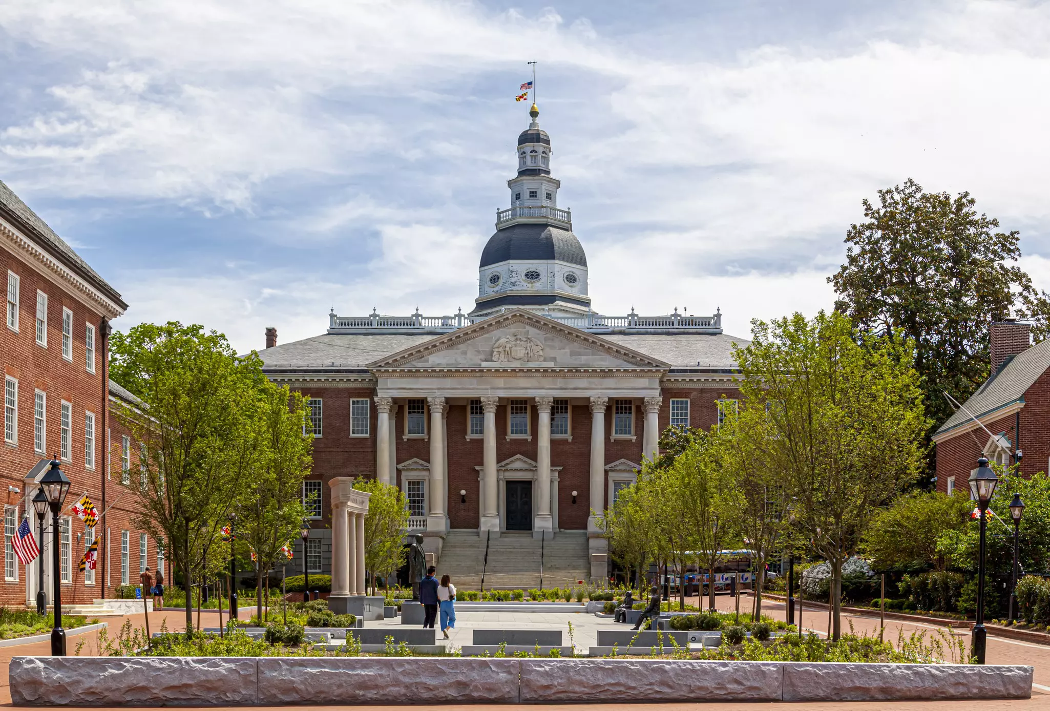 Annapolis, MD, USA 05-02-2021: Historical Maryland State Capitol building in Annapolis, the oldest state house that is still in use. Other state government buildings such as court of appeal and senate are seen on each side.