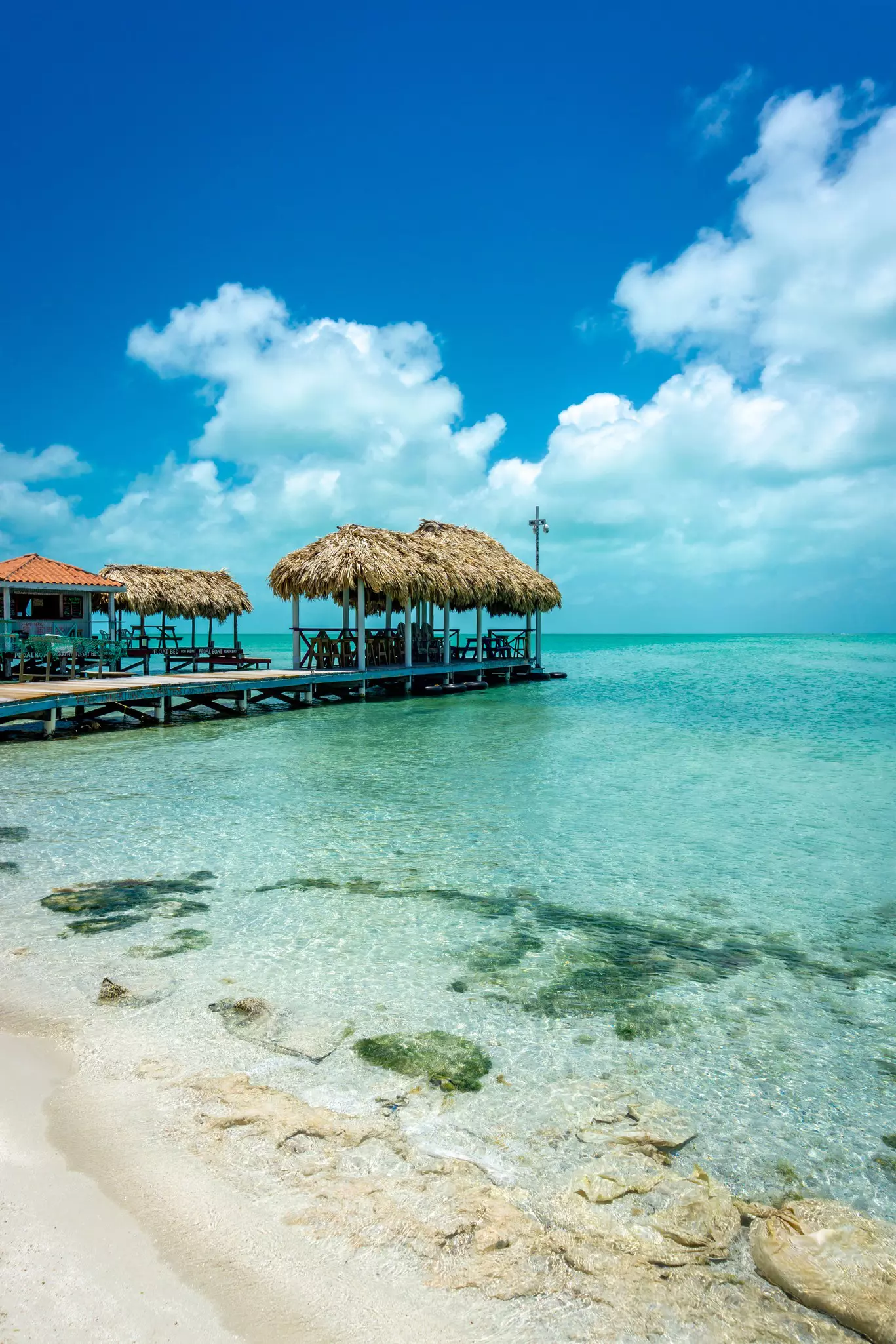 Belize Beaches in Caye Caulker and Ambergis Caye atolls and islands.
