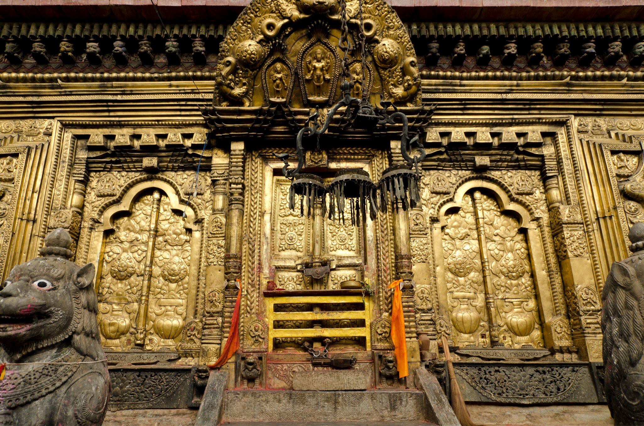 Gold-plated metal door of Temple in Nepal