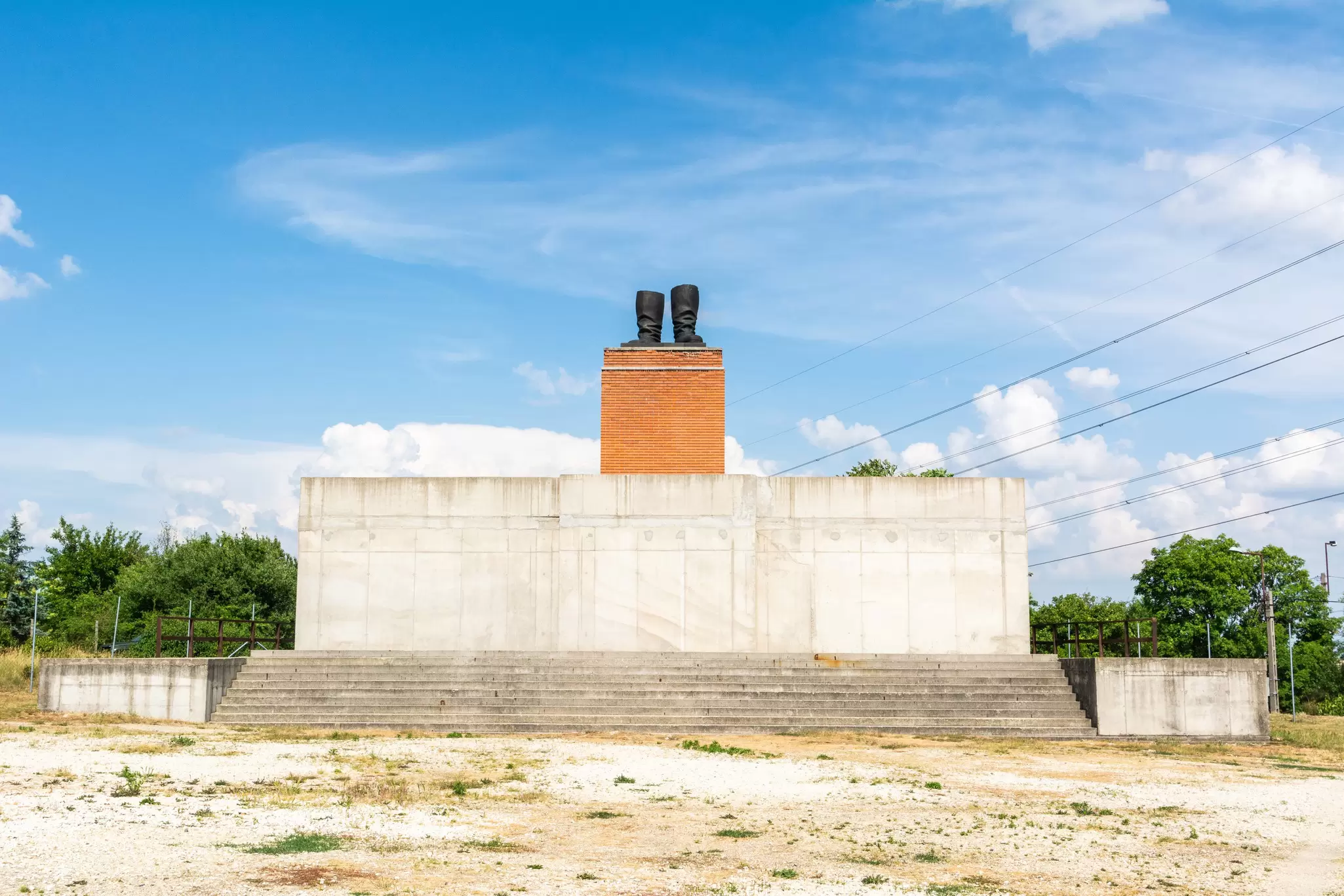 Huge pedestal with a pair of Stalin's boots at Memento Park in Budapest, Hungary.