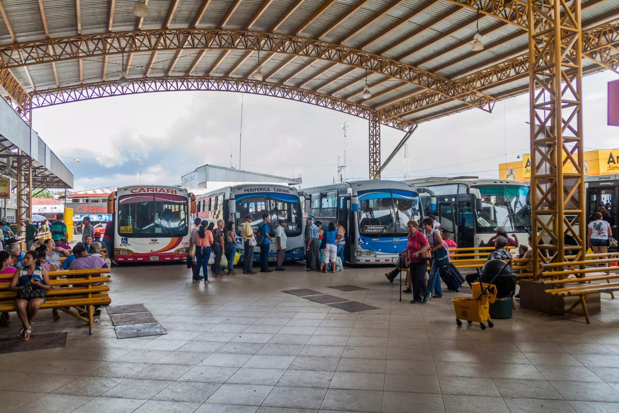 View of buses at the bus station in Cariari town.