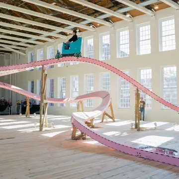 EJ’s Hill’s “Brake Run Helix” is a fully functioning roller coaster that has taken over one of MASS MoCA’s largest galleries for 2023 © Kaelan Burkett / courtesy of MASS MoCA