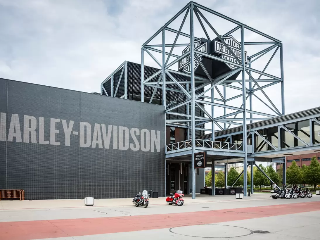 Modern looking museum with the words "Harley-Davidson" in large lettering on the outside wall.