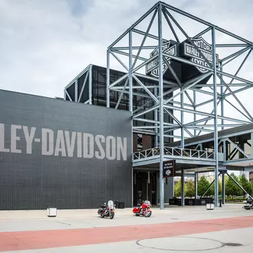 Modern looking museum with the words "Harley-Davidson" in large lettering on the outside wall.