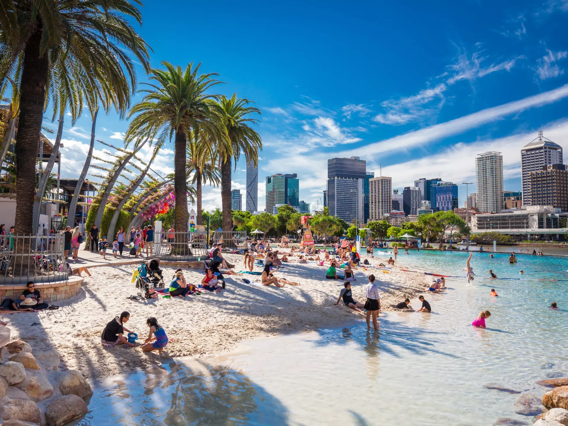 BRISBANE, AUS - APRIL 17 2016: Streets Beach in South Bank Parkland. It's inner-city man-made beach next to city center.
409427176
street, australia, park, artificial, river, travel, view, lifeguards, central, sand, urban, landmark, south, holiday, swim, skyline, summer, bank, people, family, beach, center, architecture, city, pool, buildings, tourism, water, brisbane, vacation, queensland, capital, cityscape, southbank, cbd