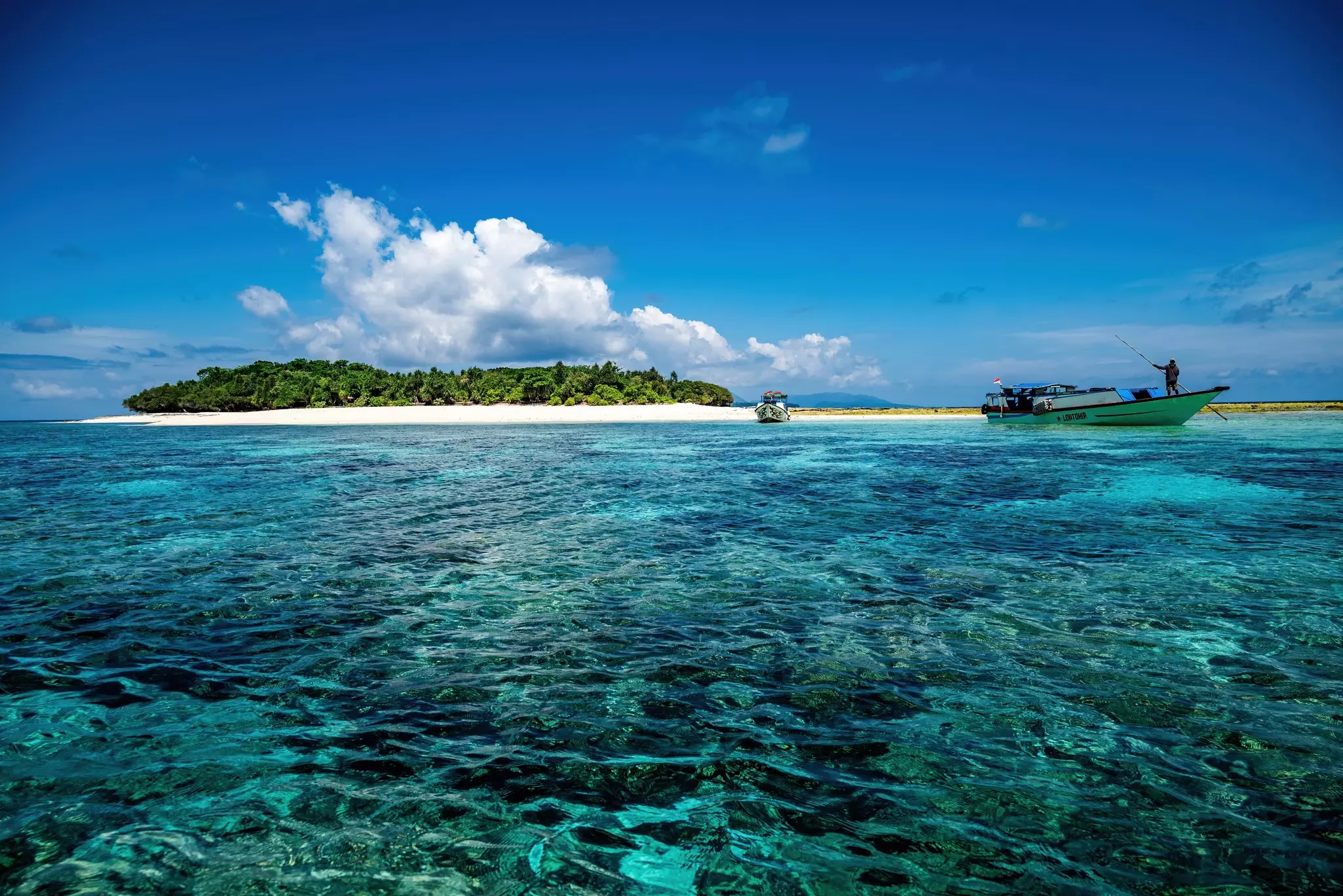 Boats off of Banda Islands, Indonesia.