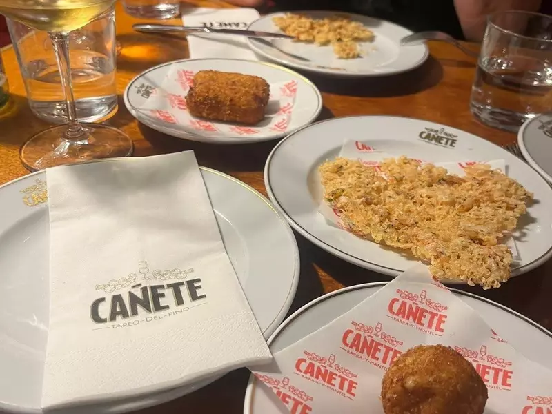 A plate of croquettes and shrimp pancakes