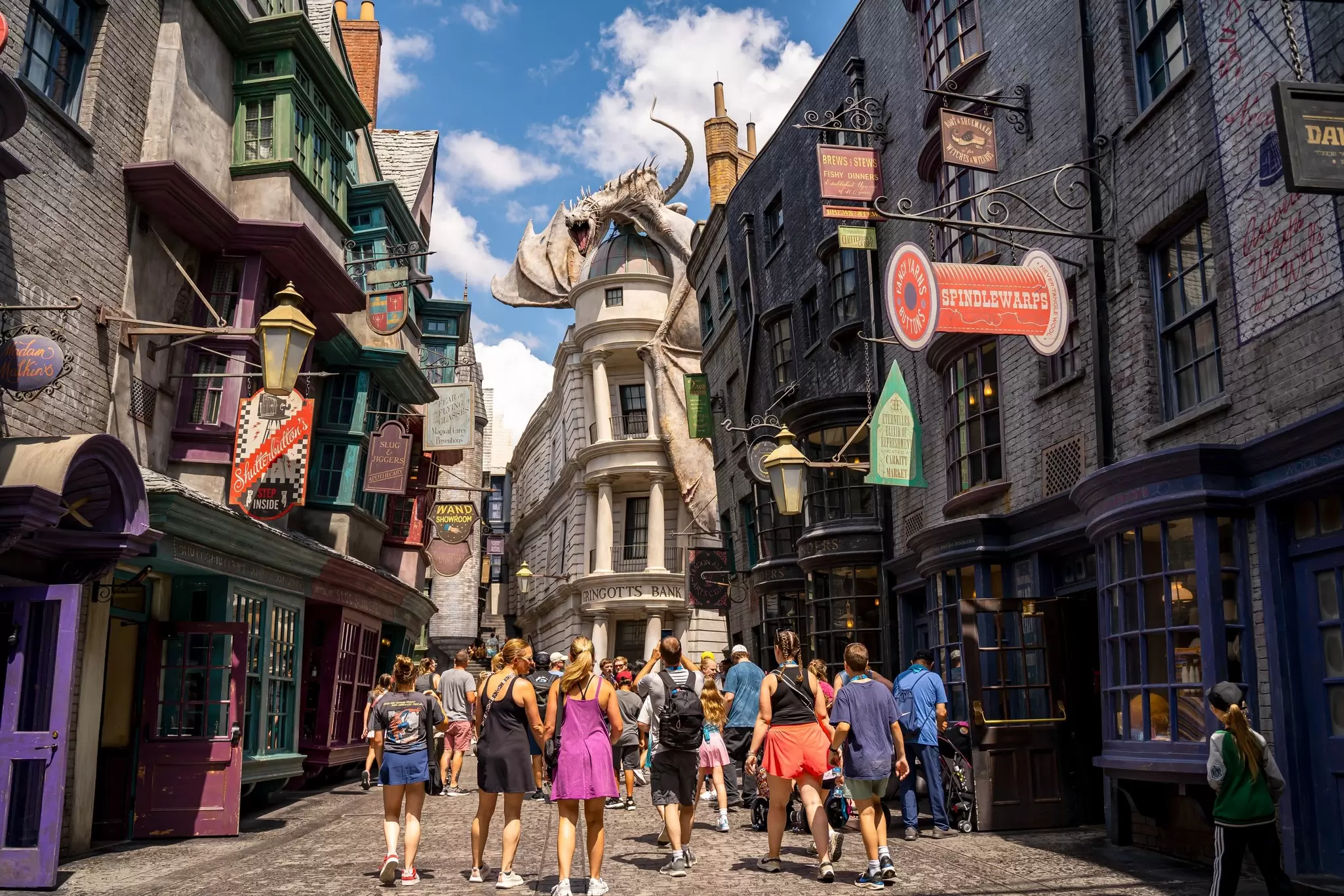 Visitors explore Diagon Alley at The Wizarding World of Harry Potter at Universal Studios Orlando, Florida.