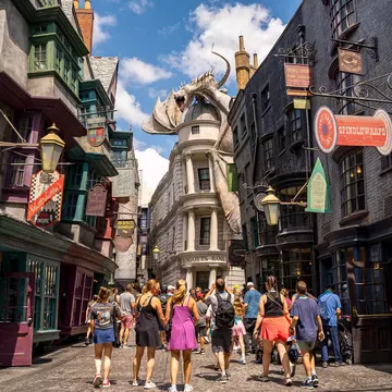 Visitors explore Diagon Alley at The Wizarding World of Harry Potter at Universal Studios Orlando, Florida.