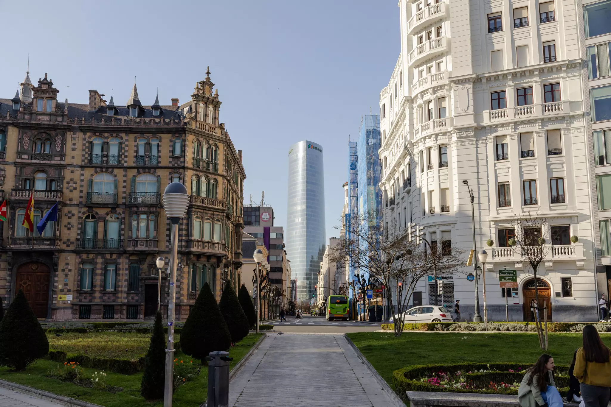 View of a park corner and a city block in Bilbao