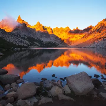 Sunrise at tourist camp Frey, Tonchek lagoon, Patagonia, Argentina.
130814792
america, andes, argentina, blue, calm water, camp, clouds, color, destination, frey, lagoon, landscape, mountain, nature, outdoors, panorama, park, patagonia, peak, red, reflection, remote, rocks, scenic, shelter, sky, south, south america, sunrise, tonchek, tourism, tourist, travel, trekking, vacation, view, water