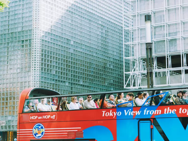 A red tourist bus in Ginza district.
