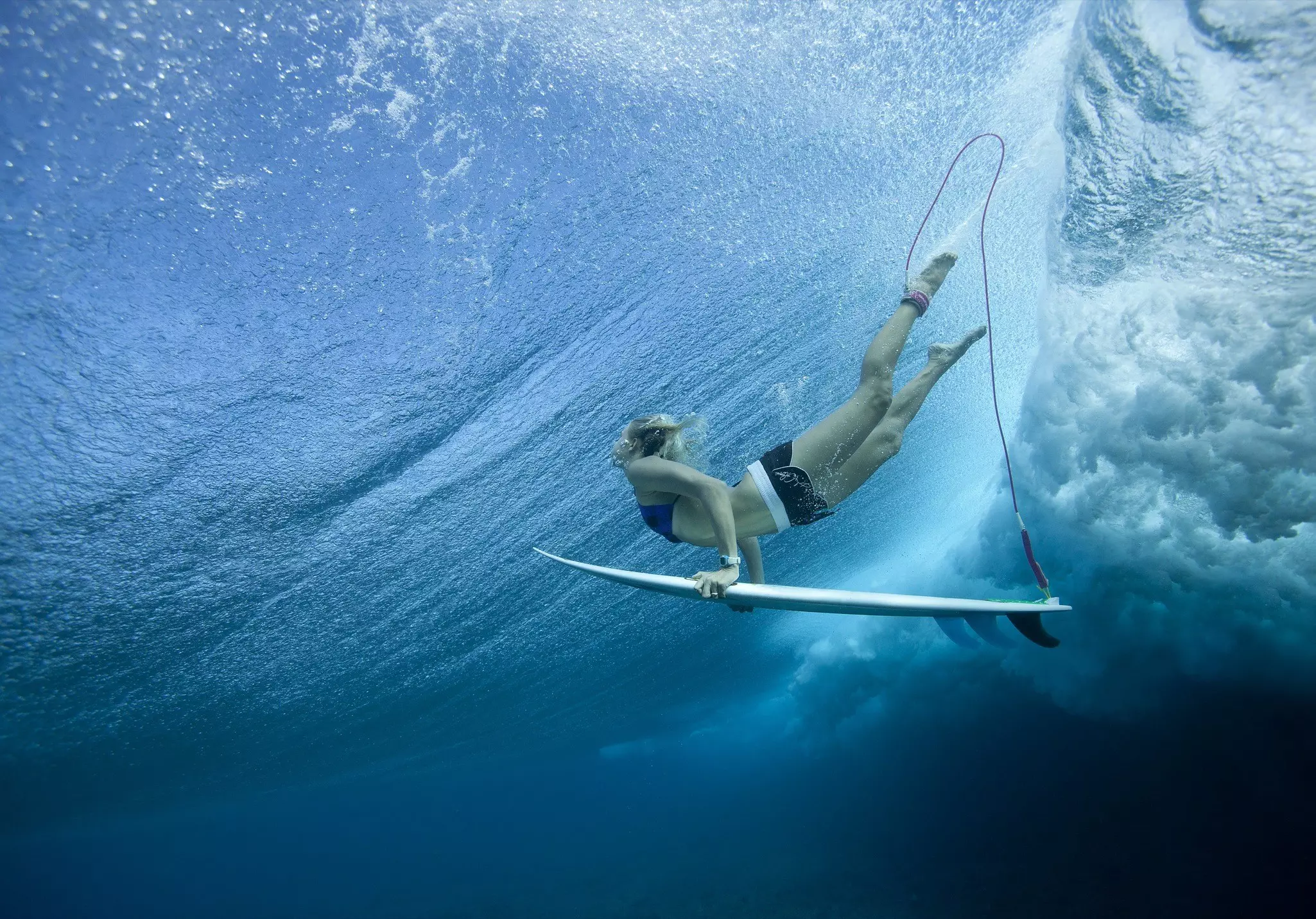 Female Pro surfer at Cloud Break Fiji