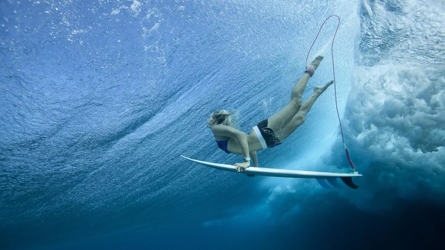 Female Pro surfer at Cloud Break Fiji