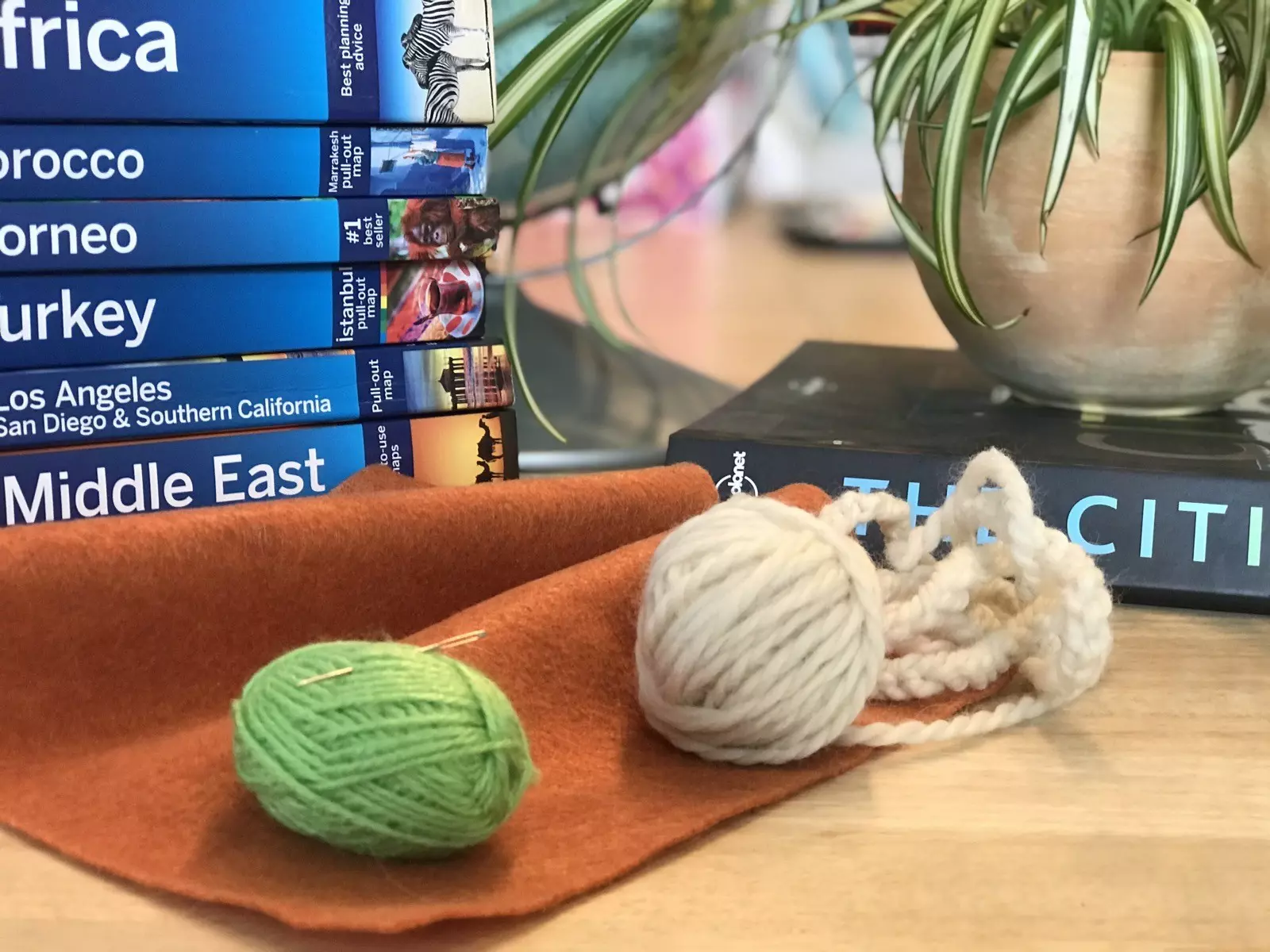 Simple supplies: a rectangle of felt, some embroidery thread, a needle and a thicker weight yarn are all you need for this project © Sarah Stocking / Lonely Planet