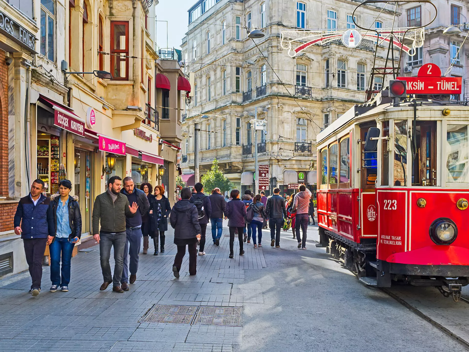 ISTANBUL, TURKEY - JANUARY 22, 2015: The old red tram in Istiklal Caddesi (Independence Avenue), the central shopping street of the city, on January 22 in Istanbul.
asia, attraction, avenue, building, caddesi, city, cityscape, europe, independence, istanbul, istiklal, landmark, neighborhood, nostalgia, old, public, quarter, red, retro, shopping, sightseeing, taksim, tourism, tram, tramway, transport, travel, turkey, urban
