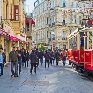 ISTANBUL, TURKEY - JANUARY 22, 2015: The old red tram in Istiklal Caddesi (Independence Avenue), the central shopping street of the city, on January 22 in Istanbul.
asia, attraction, avenue, building, caddesi, city, cityscape, europe, independence, istanbul, istiklal, landmark, neighborhood, nostalgia, old, public, quarter, red, retro, shopping, sightseeing, taksim, tourism, tram, tramway, transport, travel, turkey, urban