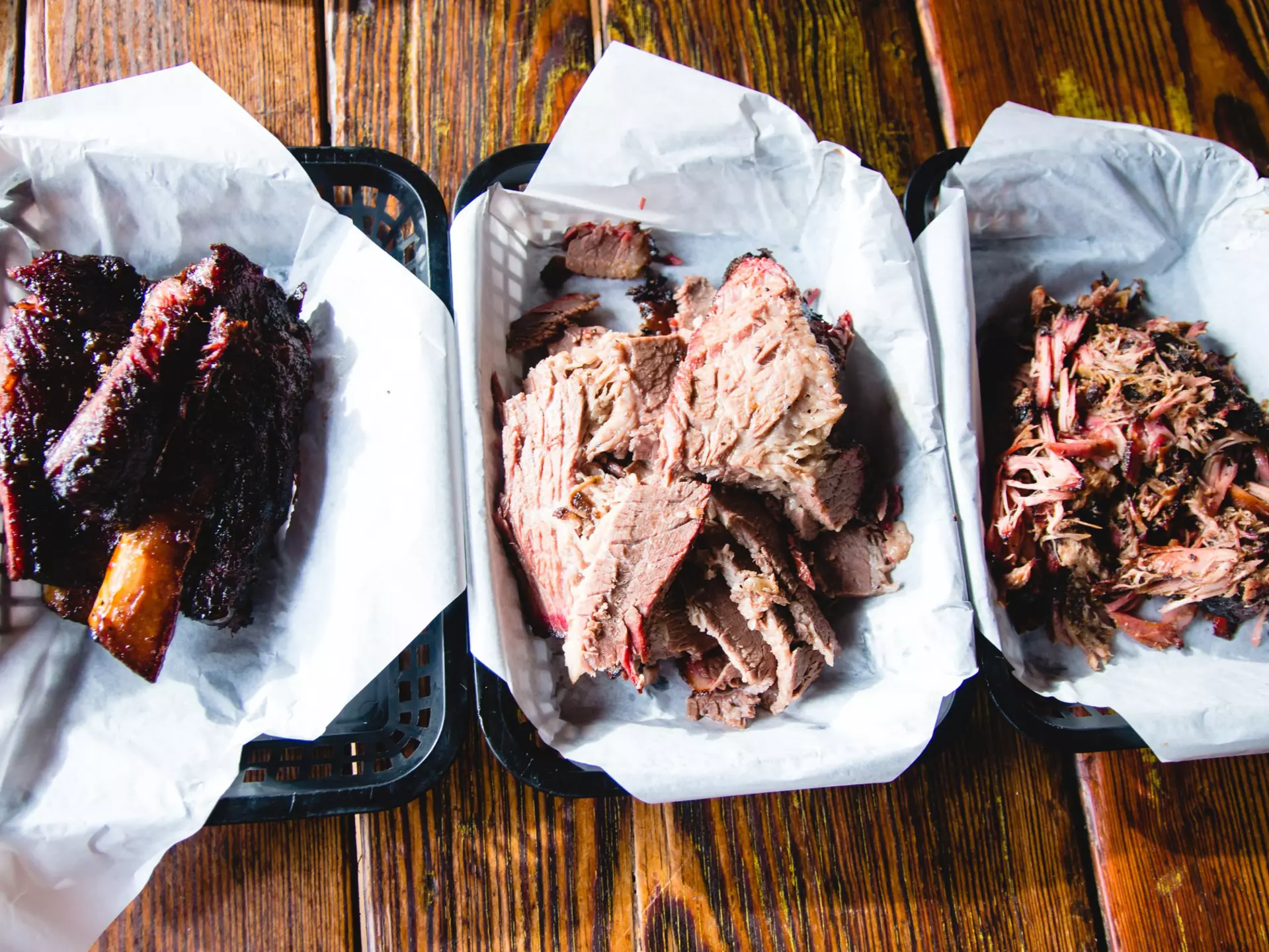 Ribs, brisket and pulled pork on a wooden table.
1034867620
pulled pork, brisket, meat love, food, foodie, travel, texas bbq, barbecue, bbq grill, restaurant, tasty, dinner, grilled, grill, lunch, cooking, meal, meat, delicious