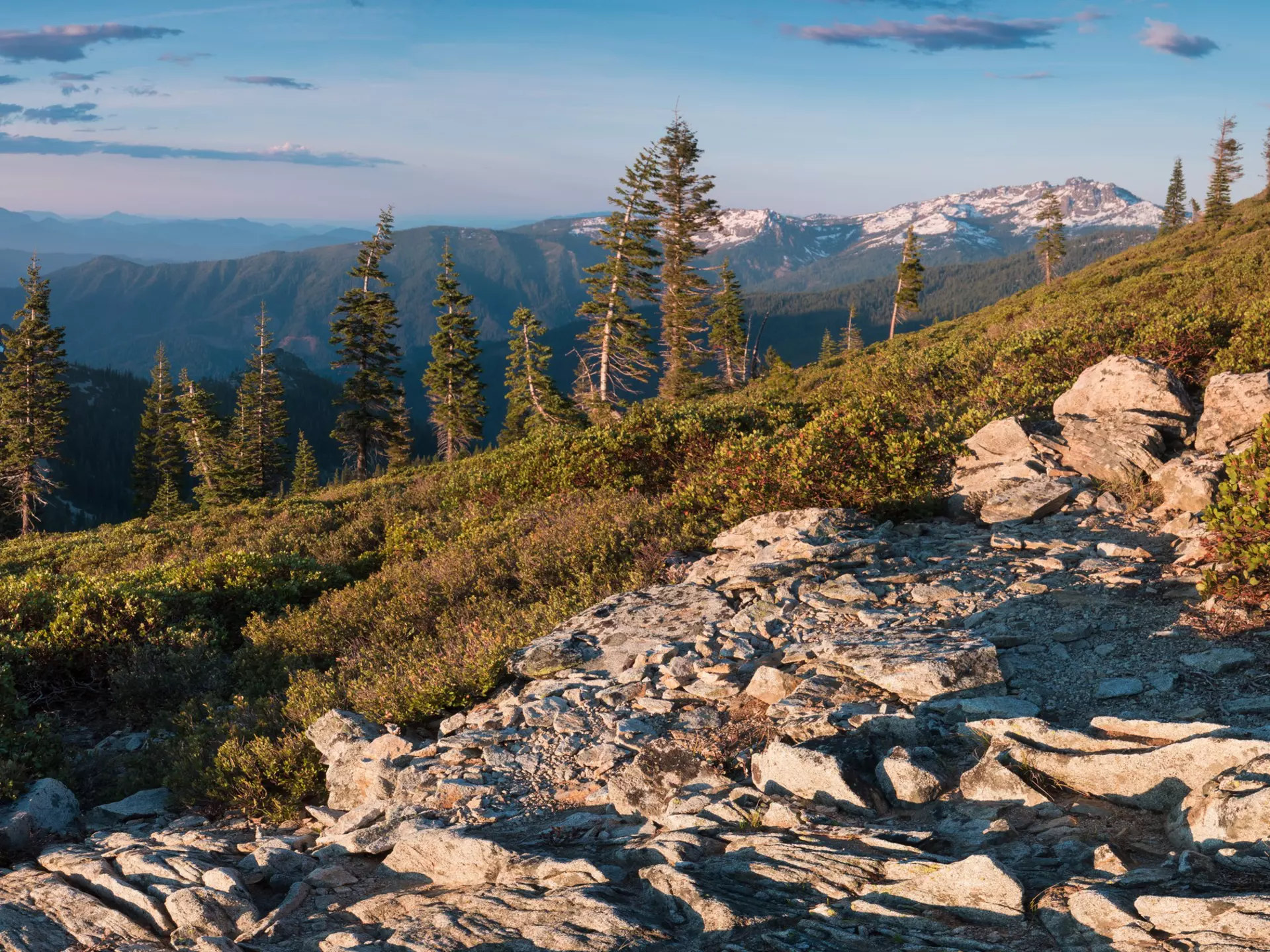 Snow-capped peaks and sunshine in Castle Crags State Park. Michal Balada/Shutterstock