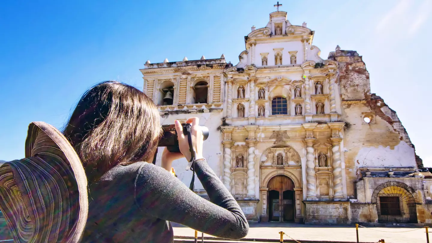 From eating at street food stalls to choosing the best hostels, here's how to travel around Guatemala on a budget © Kryssia Campos / Getty Images