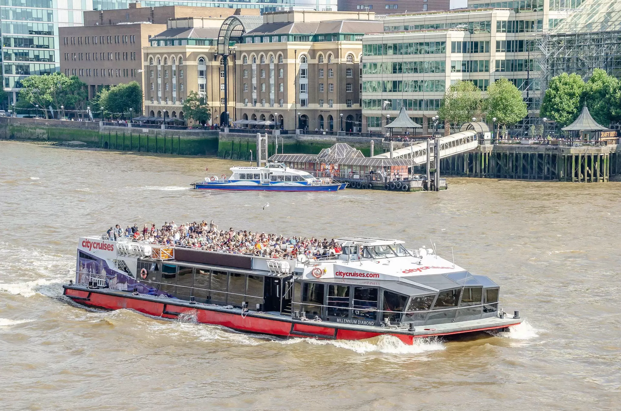 Ferries on the River Thames in London on a sunny day