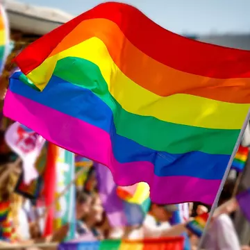 Lgbt pride rainbow flag during parade in NYC, USA at a Pride parade