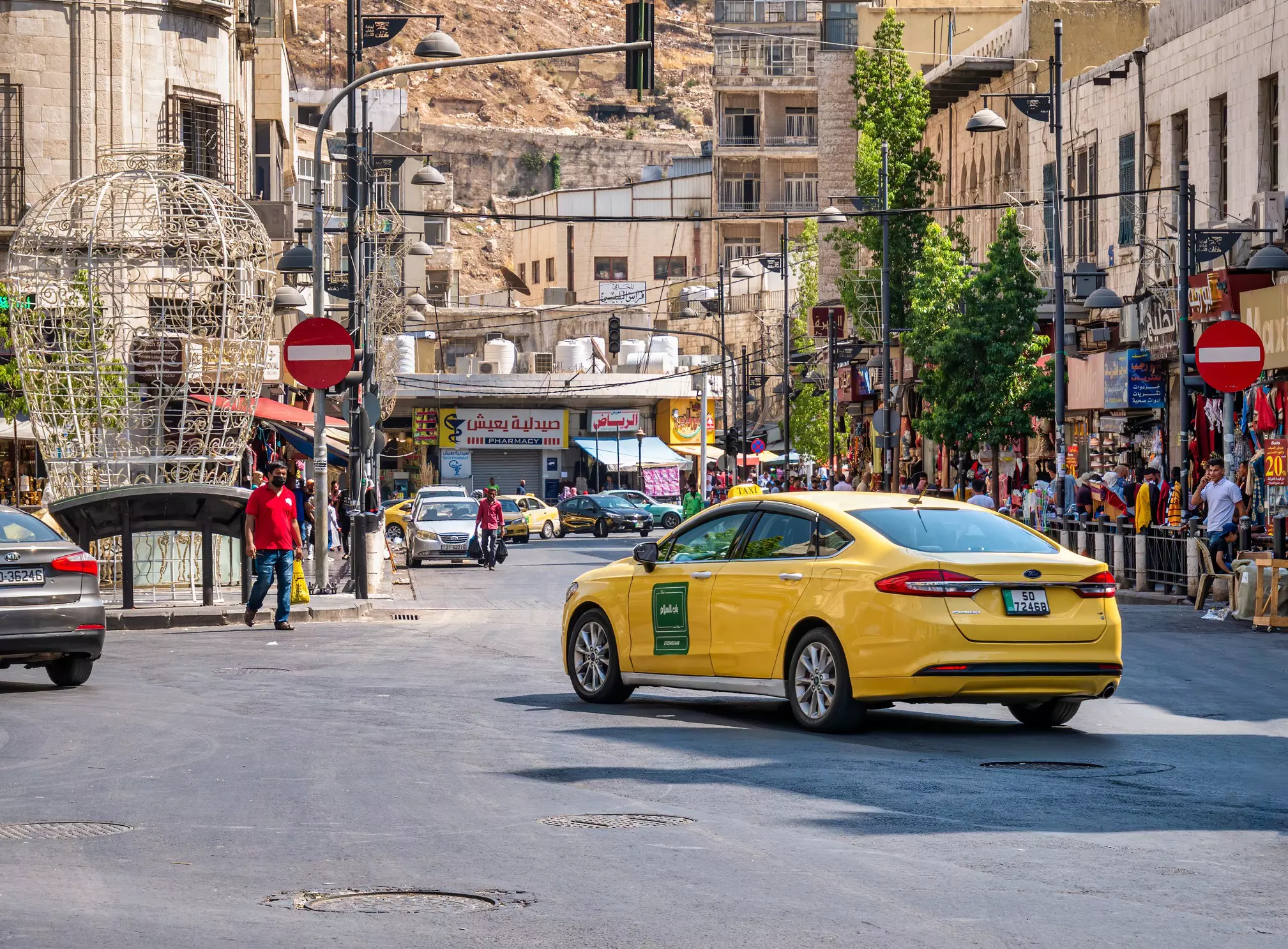 Taxis are plentiful in Jordan's cities but rideshare apps are more reliable for tourists © Cristi Croitoru / Getty Images