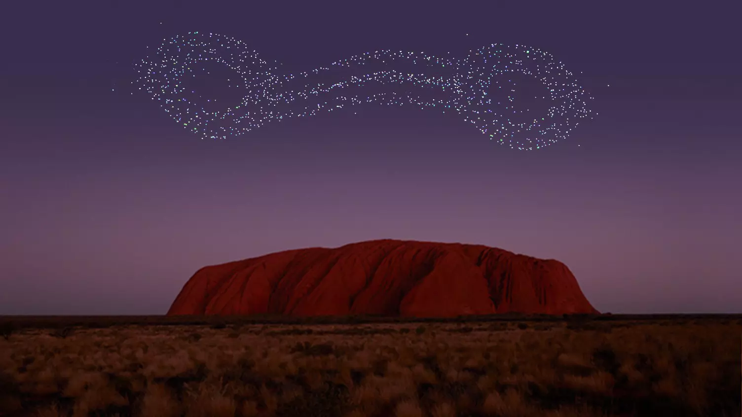 The immersive spectacle Wintjiri Wiṟu over Uluru uses choreographed drones and audio narration to showcase Aboriginal storytelling © courtesy Ayers Rock Resort