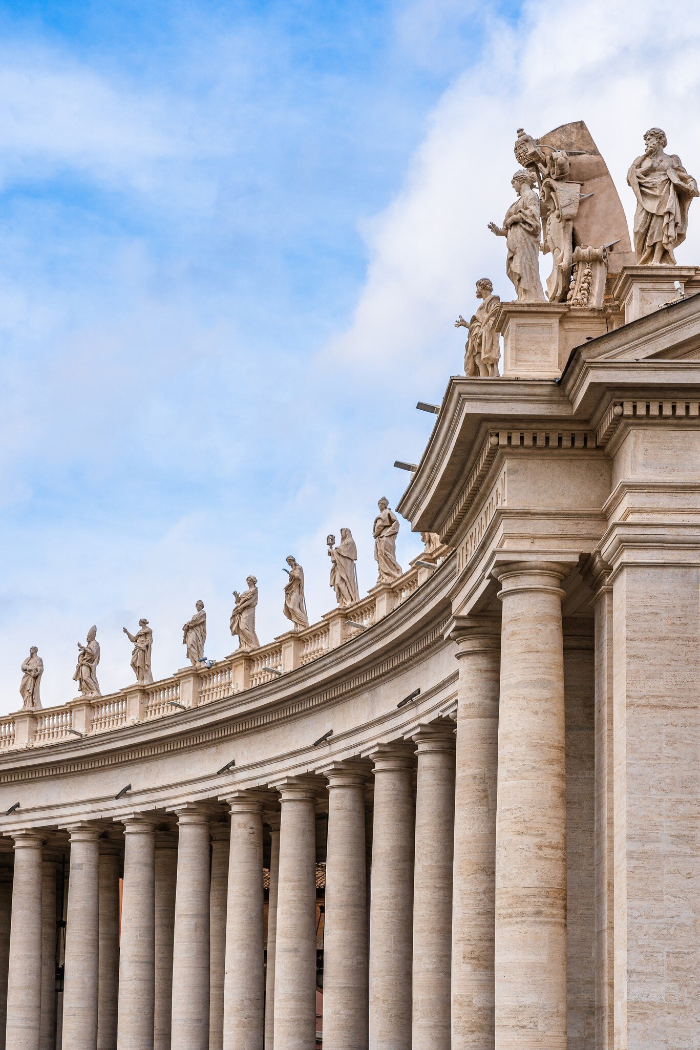 Columns and statues at St. Peter's Square in Vatican City, Rome, Lazio region, Italy. 