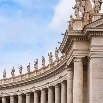 Columns and statues at St. Peter's Square in Vatican City, Rome, Lazio region, Italy. 