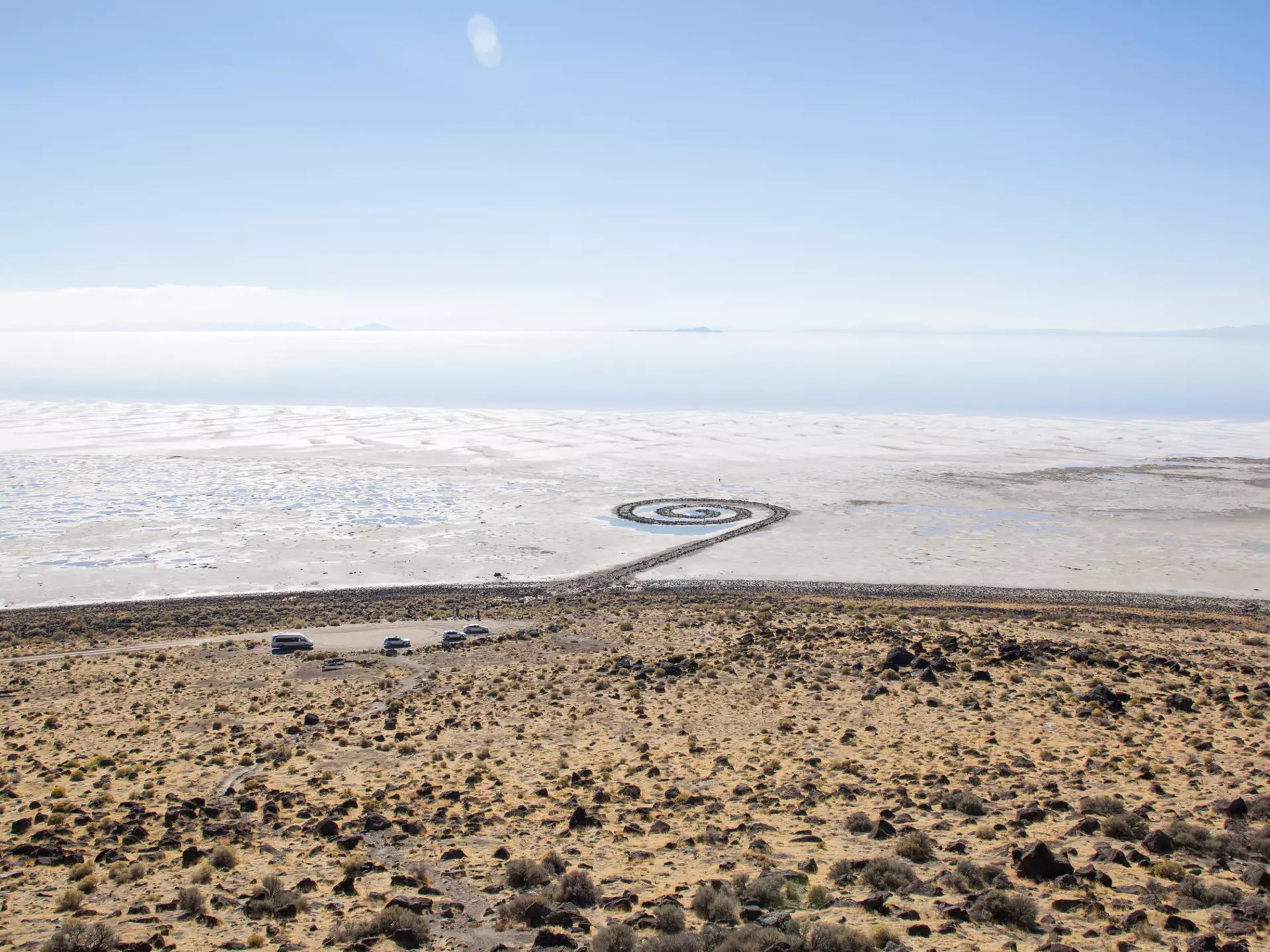TTRHT1 Aerial view of Spiral Jetty against blue sky during sunny day