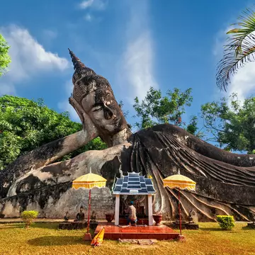 Mythological and religious statues at Wat Xieng Khuan Buddha park. Vientiane, Laos