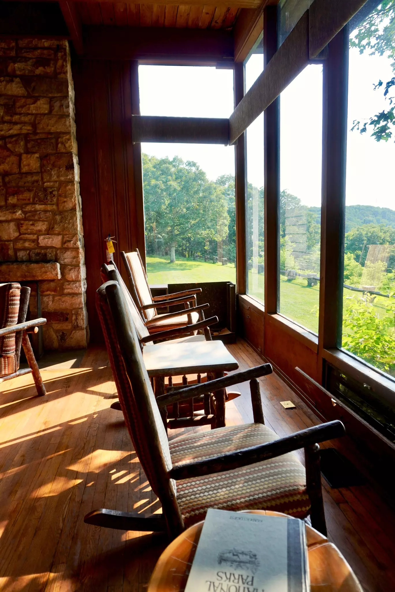 rustic wooden inn against a blue sky and snowy ground in New York