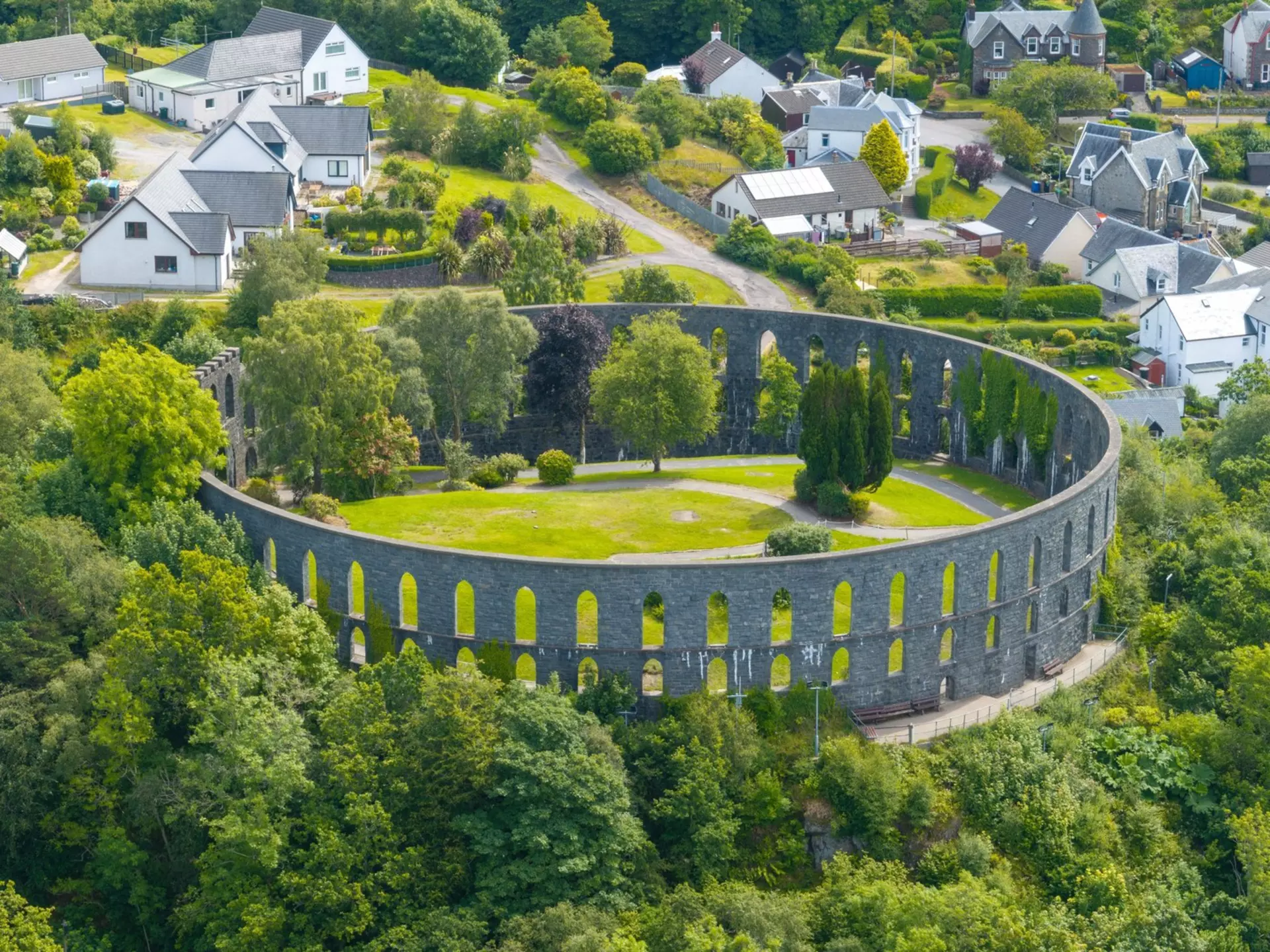 McCaig's Tower rises above the rooftops of Oban in Scotland. Felix Lipov/Shutterstock