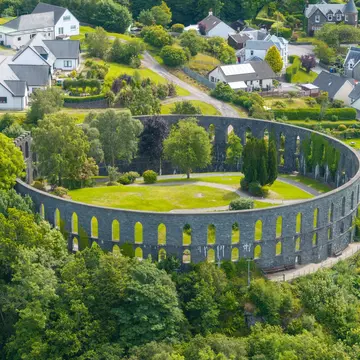 McCaig's Tower rises above the rooftops of Oban in Scotland. Felix Lipov/Shutterstock