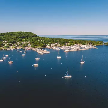 For those who love the outdoors, Door County, Wisconsin has plenty to do, such as sailing in Fish Creek Harbor. Matt Sampson Photography/Getty Images