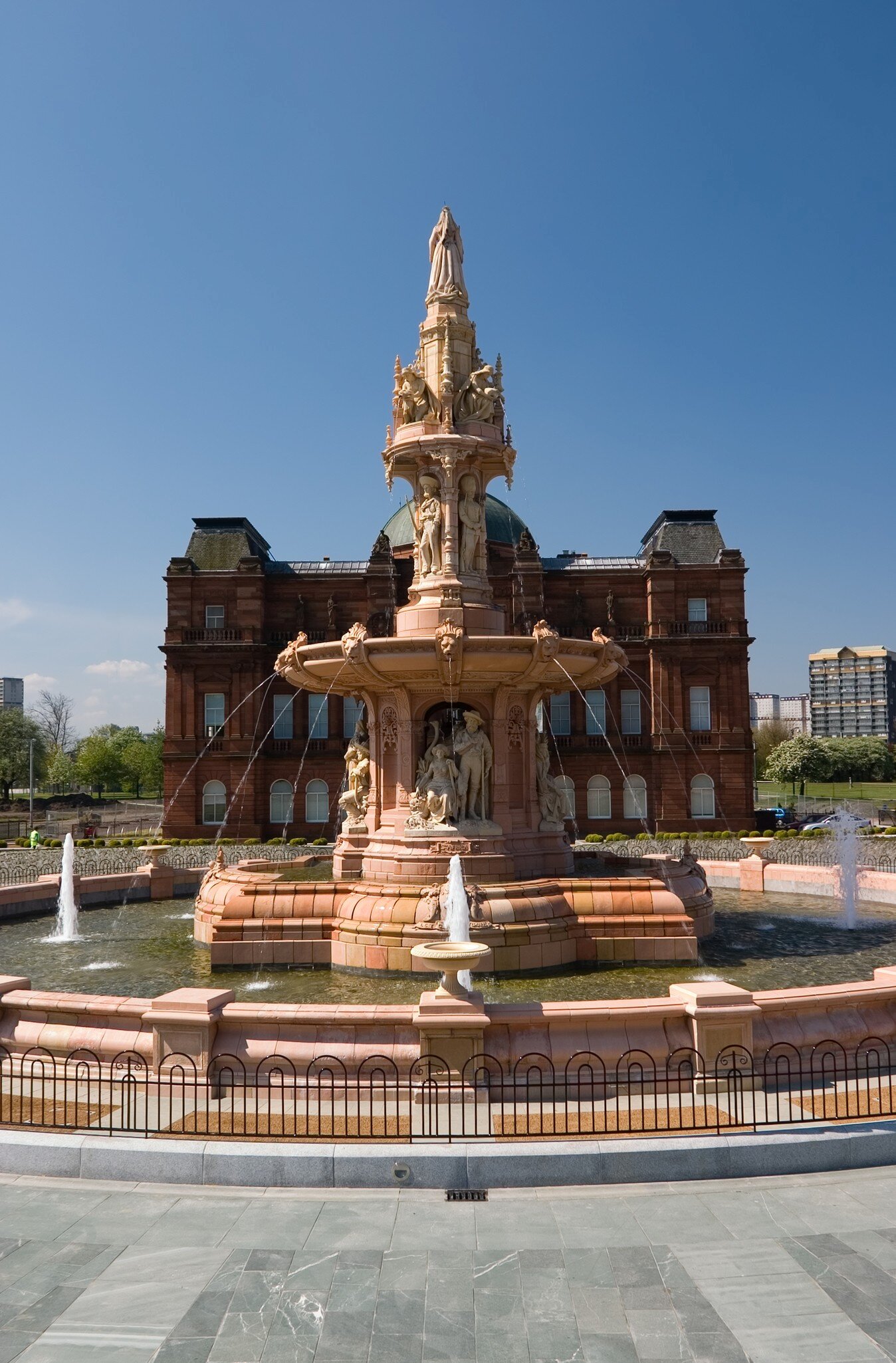 The Doulton Fountain in Glasgow Green, built in 1888, and the world's largest terracotta fountain, with the People's Palace museum behind.
