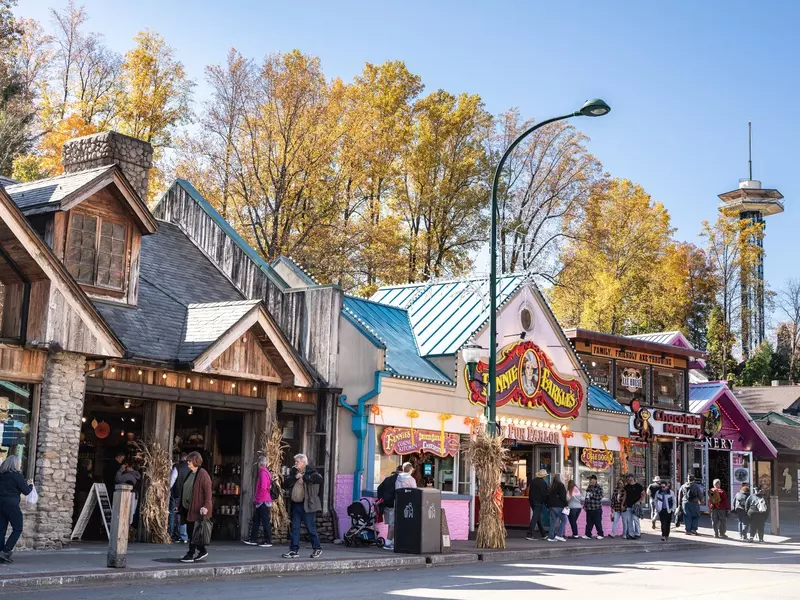 Street view of popular tourist city of Gatlinburg Tennessee in the Smoky Mountains with attractions in view