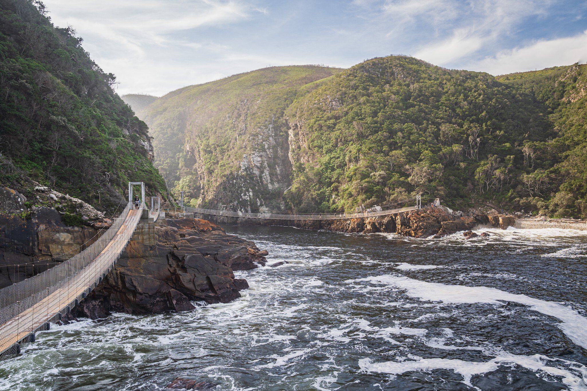 Storms River Bridge, South Africa - 17.07.2019 - Storms River Bridge in Tsitsikamma National Park, License Type: media, Download Time: 2026-02-02T17:48:39.000Z, User: rhylton_redventures, Editorial: true, purchase_order: 65050 - Digital Destinations and Articles, job: Lonely Planet, client: wip, other: Rhianydd Hylton