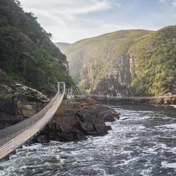 Storms River Bridge, South Africa - 17.07.2019 - Storms River Bridge in Tsitsikamma National Park, License Type: media, Download Time: 2026-02-02T17:48:39.000Z, User: rhylton_redventures, Editorial: true, purchase_order: 65050 - Digital Destinations and Articles, job: Lonely Planet, client: wip, other: Rhianydd Hylton