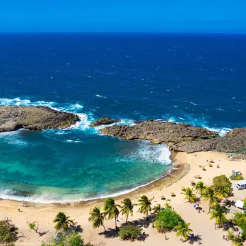 Puerto Rico has around 300 miles of coastline and many varied beaches to explore, including the dramatic Playa Mar Chiquita. Getty Images