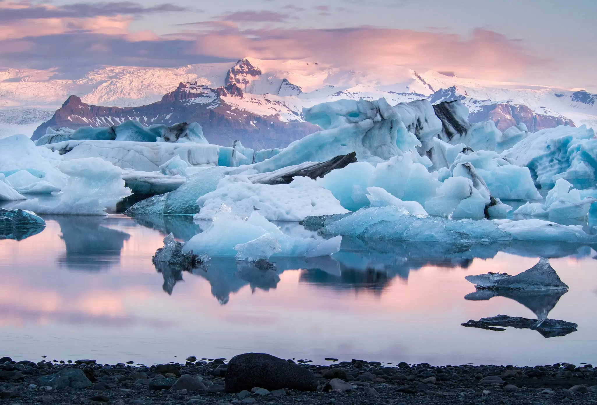 View of the sun shining on the Jökulsárlón glacier lagoon in Iceland.