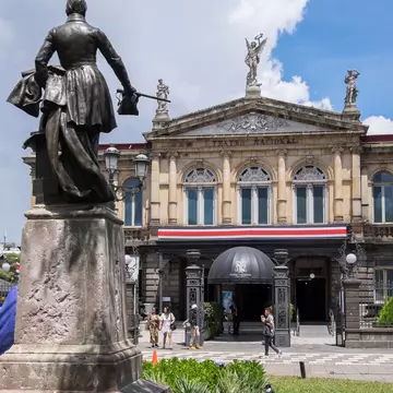 San José, Costa Rica - October 08, 2022: Juan Mora Square and National Theater in the urban center of the city