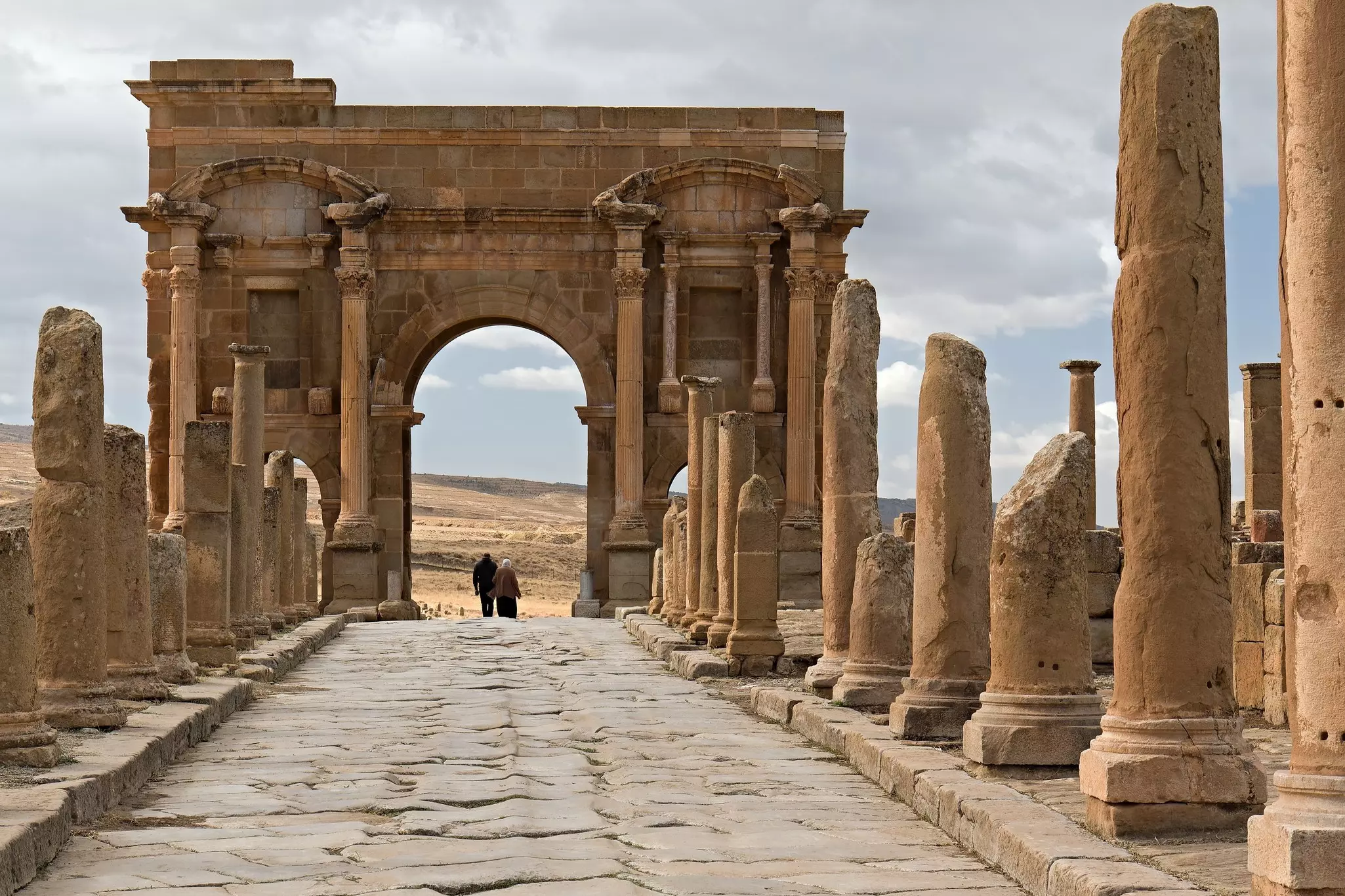 The Arch de Trajan, part of the ruins of the Roman city of Timgad in the present-day African country of Algeria. Rostasedlacek/Shutterstock
