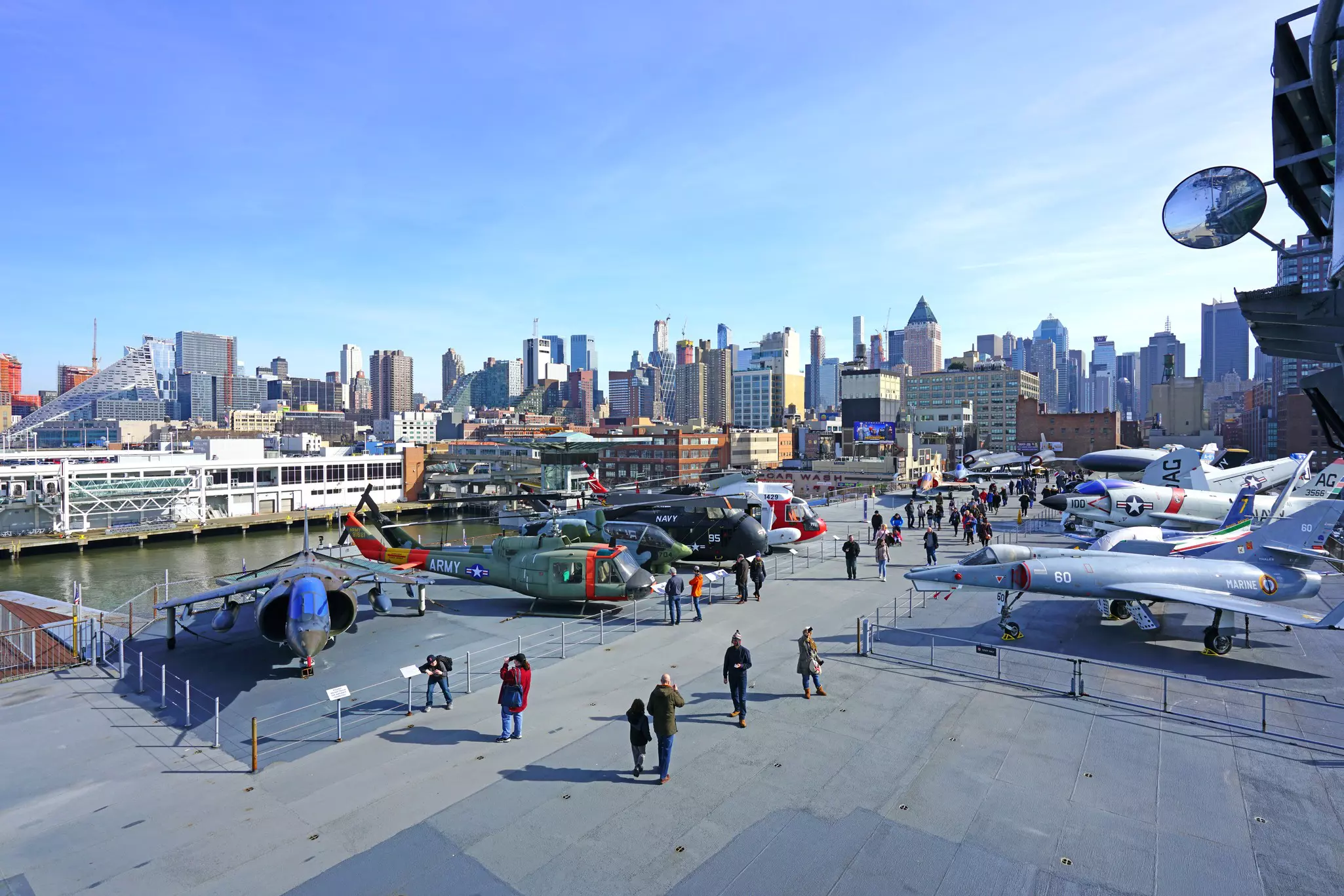 USS Intrepid Sea, Air & Space Museum with the Manhattan, New York skyline in the background.