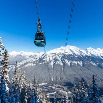 Banff, Alberta / Canada - 2.6.2019: Gondola winter views at Sulphur Mountain, Travel Alberta, Tourism, Banff National Park, Canada  License Type: media  Download Time: 2023-10-18T02:44:22.000Z  User: dermothegarty77  Is Editorial: Yes  purchase_order:   