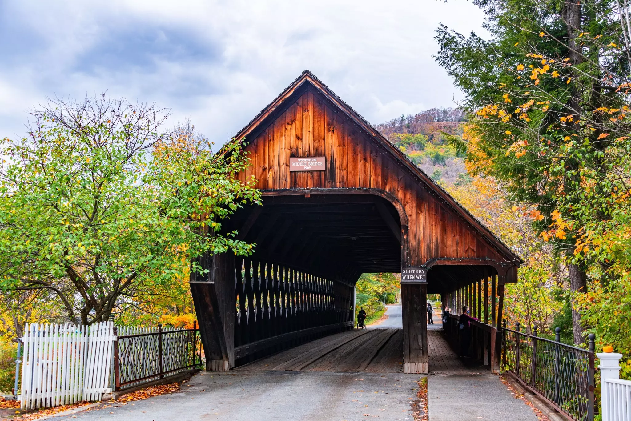A view of the asymmetrical Woodstock Middle Bridge, a covered bridge in Woodstock, Vermont, New England, USA