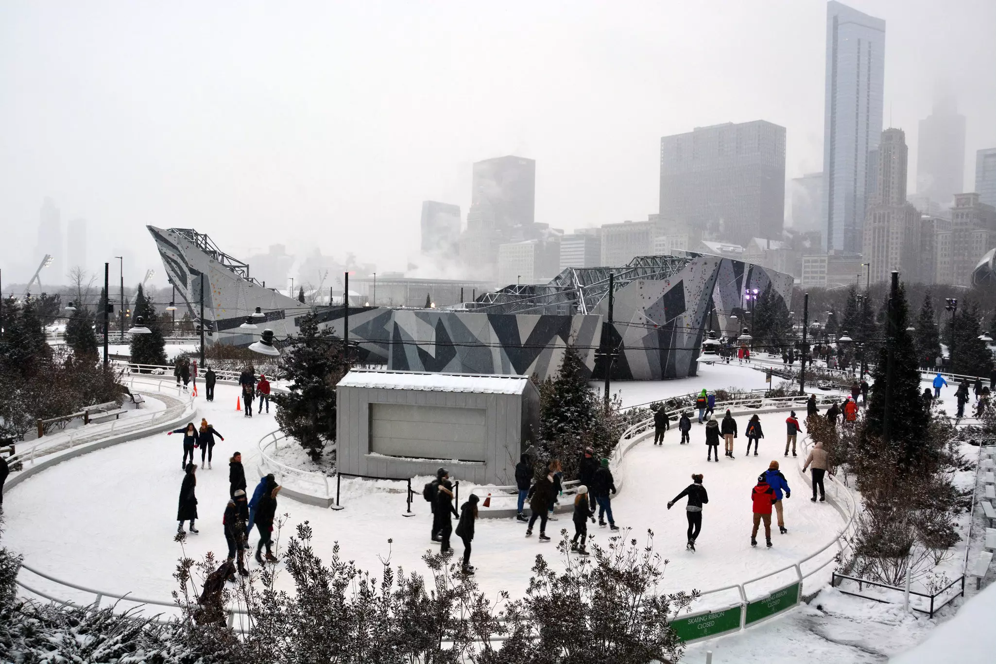 Chicago, Illinois, United States - 12-29-2017: Tourists and locals brave the cold and the snow on Chicago's lakefront Skating Ribbon in Maggie Daley Park.
787732357
skating, track, winter sports, winter, storm, path, christmas, holiday, visitors, locals, tourism, tourists, family, fun, season, seasonal, cityscape, skyline, public, park, daley, maggie, ribbon, ice, sports, recreation, travel, city, building, white, view, urban, beautiful, cold, scene, snow, people, sightseeing, ice skating rink, ice skating