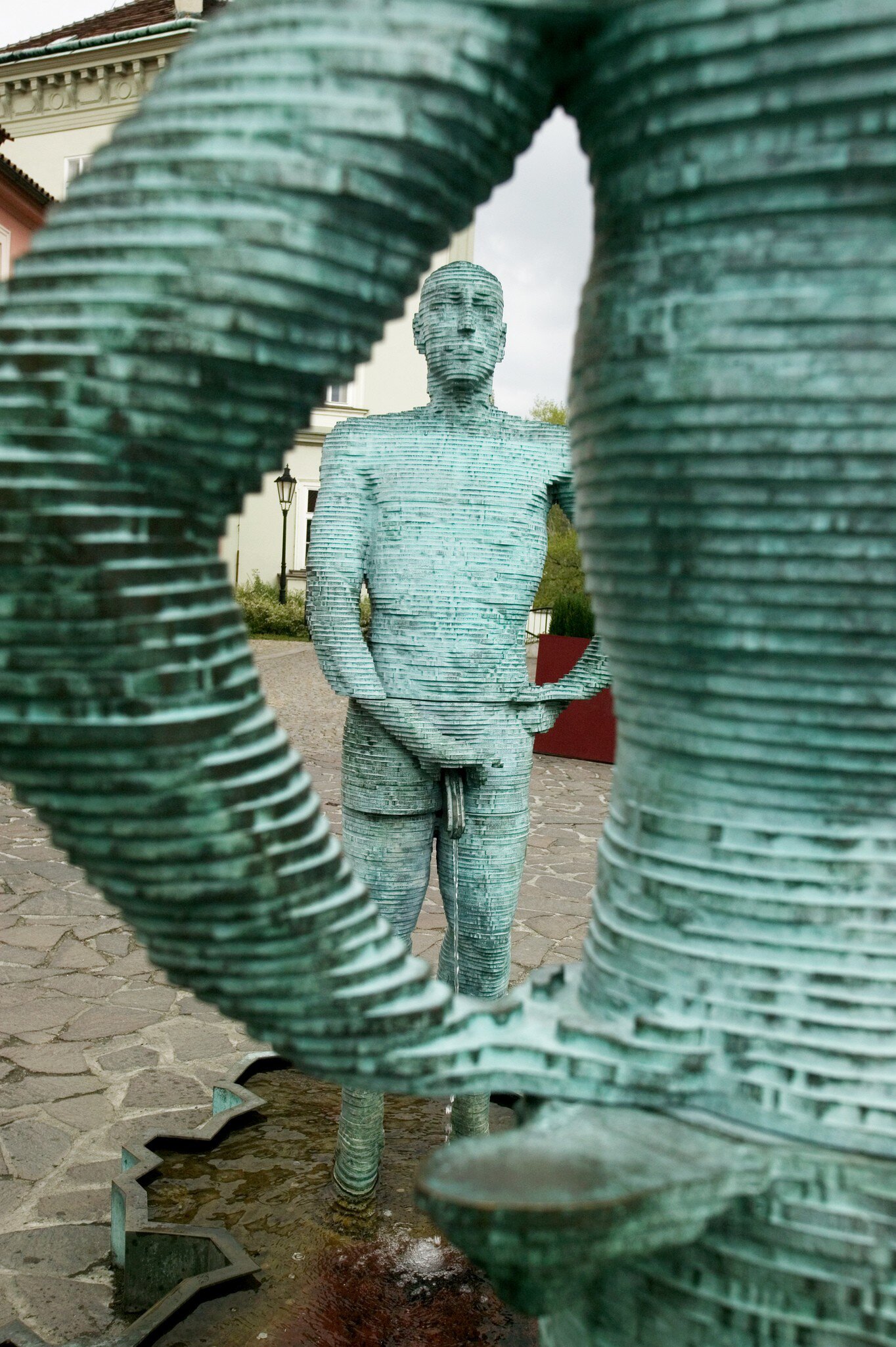 View of David Černý’s "urinating" sculpture titled "Proudy" in Prague, Czechia.