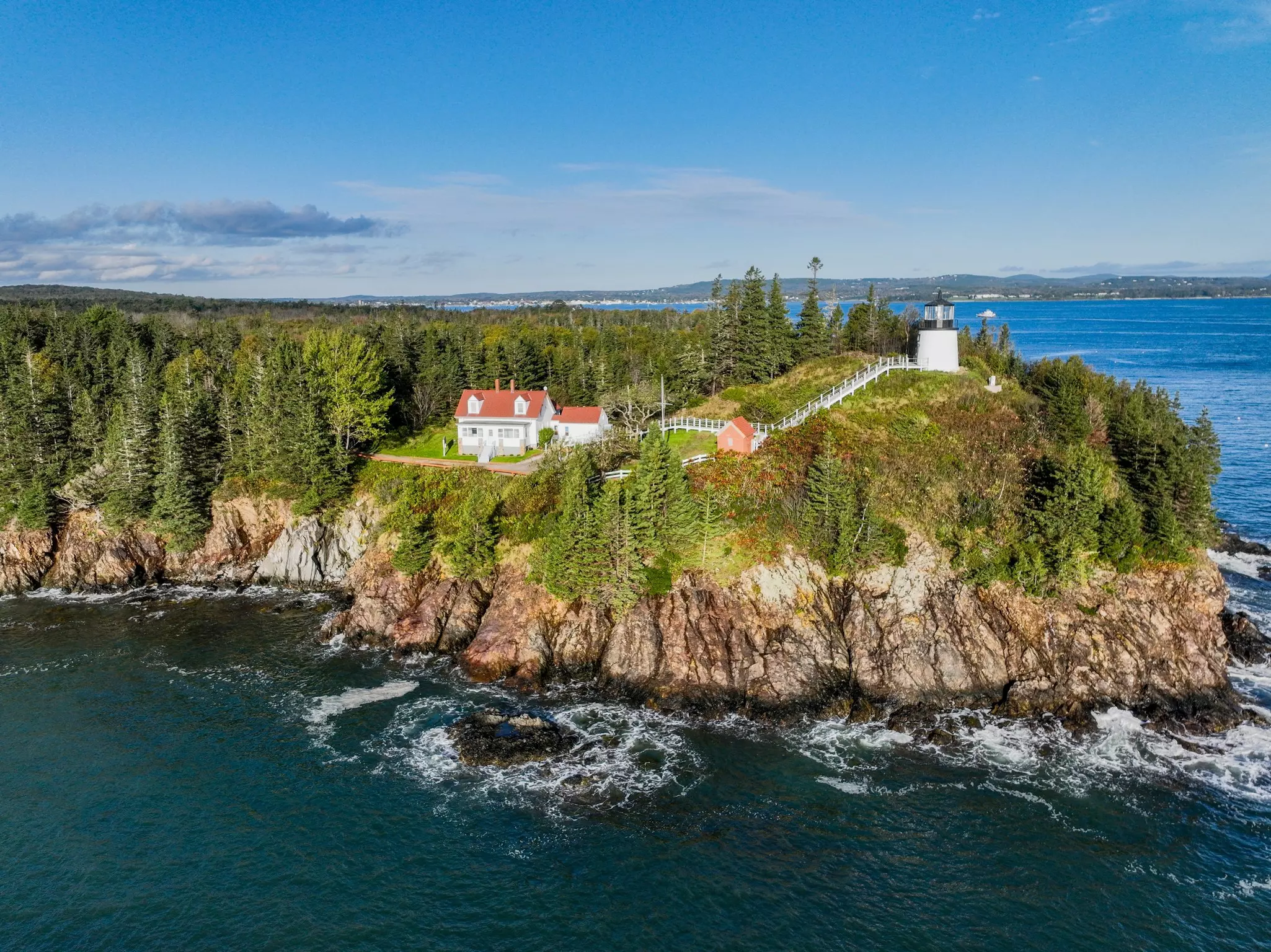 The Owls Head Light is an active aid to navigation located at the entrance of Rockland Harbor on western Penobscot Bay in the town of Owls Head, Knox County, Maine.